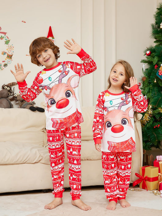 Man wearing a red and white Christmas pajama set with a reindeer graphic and fair isle pattern. - Image 5