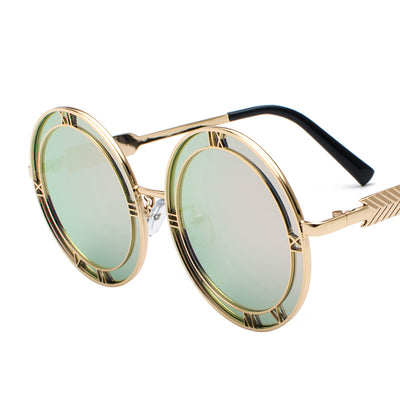 Round frame fashion sunglasses with light blue resin lenses and silver-tone metal frames featuring Roman numeral cutouts. - Image 5
