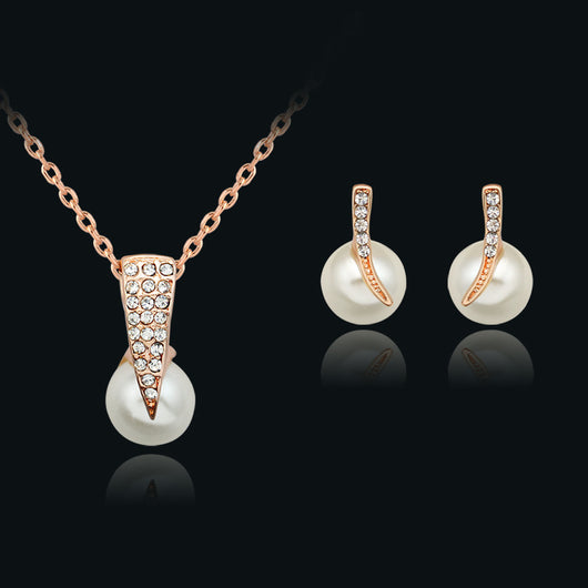 Rhinestone and pearl necklace and stud earring set with rose gold-toned metal, ideal for weddings or parties. - Image 4