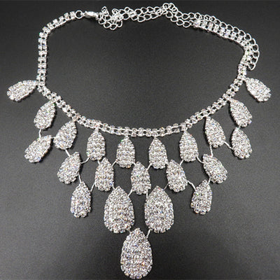 Sparkling silver-tone necklace with multiple teardrop-shaped rhinestone pendants, ideal for wedding or evening wear. - Image 3