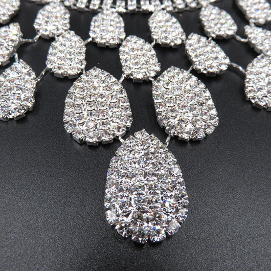 Sparkling silver-tone necklace with multiple teardrop-shaped rhinestone pendants, ideal for wedding or evening wear. - Image 2