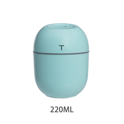 White egg-shaped mini USB humidifier with a 220ml capacity, featuring a subtle 'T' logo and grey accent line. - Image 6