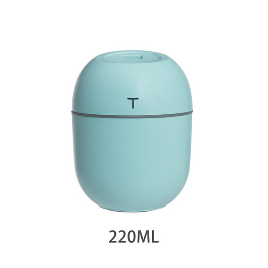 White egg-shaped mini USB humidifier with a 220ml capacity, featuring a subtle 'T' logo and grey accent line. - Image 6