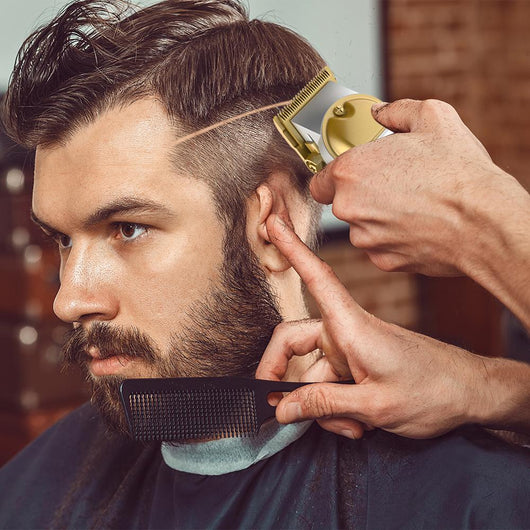 Gold VGR full metal hair clipper kit with four black guide combs, cleaning brush, charging cable, and power adapter. - Image 8
