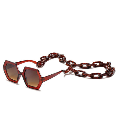 Octagonal sunglasses with brown gradient lenses and a tortoiseshell chain strap on a white background. - Image 7