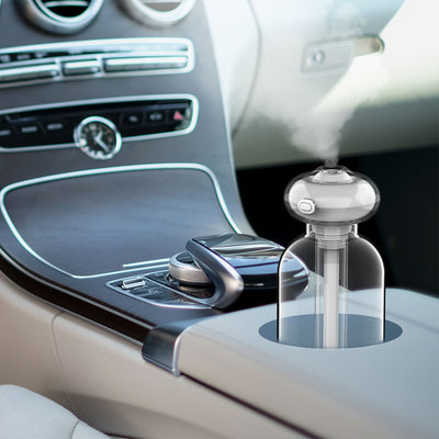 White and clear USB portable desktop humidifier with a small night light, featuring a compact design. - Image 13