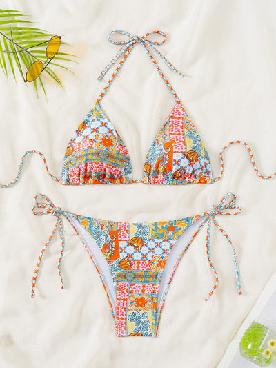 Red floral print triangle cup bikini set with matching bottom, featuring a small gold charm on the top. - Image 13