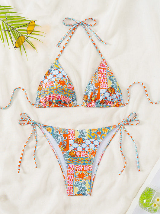 Red floral print triangle cup bikini set with matching bottom, featuring a small gold charm on the top. - Image 13
