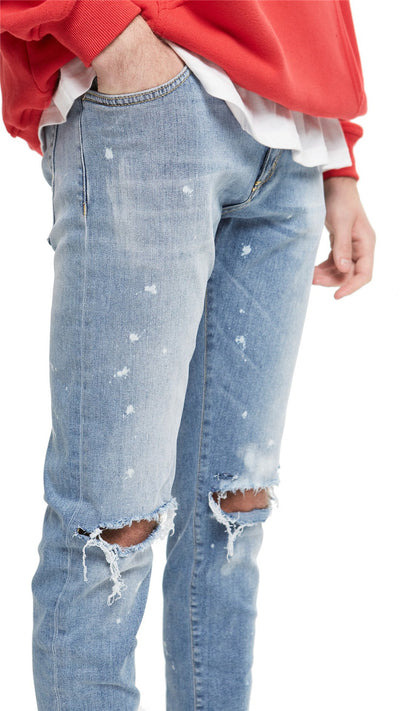 Jeans Slim Fit Azul con Corte en Rodilla y Diseño Spray Pintado - Image 12
