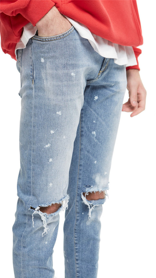 Jeans Slim Fit Azul con Corte en Rodilla y Diseño Spray Pintado - Image 12