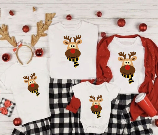 Family matching white Christmas t-shirts and baby bodysuit with 'Merry Christmas' graphic, paired with black and white plaid pajama bottoms. - Image 21