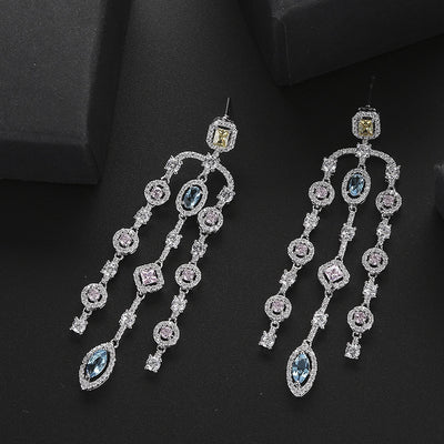 Aretes Largos de Cobre con Circonita Geométrica y Borla para Mujer - Image 5