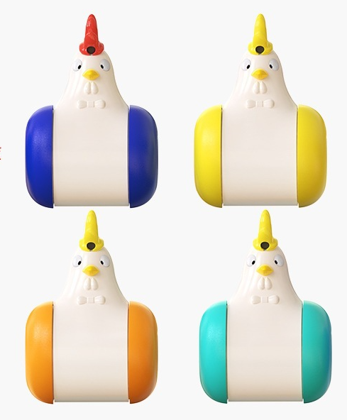 White and yellow chicken-shaped tumbler cat toy with a laser pointer, being played with by two orange tabby cats. - Image 15