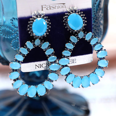 Aretes de Cristal Ovalados con Incrustaciones de Circonio y Diamante - Image 2
