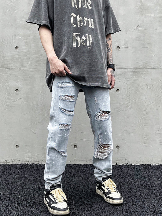 Jeans Slim Fit Desgastado con Roturas Estratégicas y Efecto Tinta - Image 10