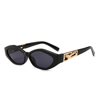 Angular cat-eye sunglasses with a tortoiseshell frame, brown gradient lenses, and gold jumping cheetah temple details. - Image 5