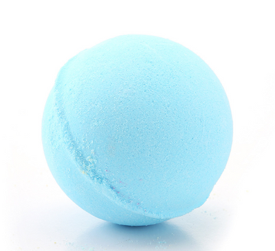 A single, round, light green bath bomb with a slightly textured surface, ready for a relaxing bath. - Image 5