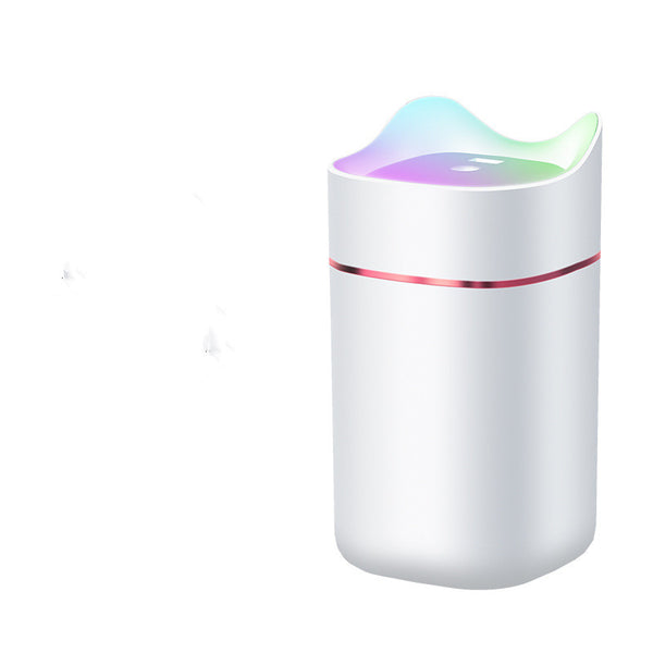 White USB desktop humidifier with a wavy top, colorful gradient lights, and a rose gold accent band.