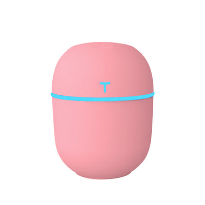 Teal egg-shaped USB humidifier with a glowing blue light band and a 'T' shaped indicator on top. - Image 11