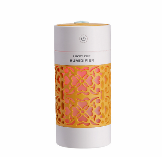 Light blue and white Lucky Cup humidifier with a decorative heart and floral cutout pattern. Features a power button. - Image 9