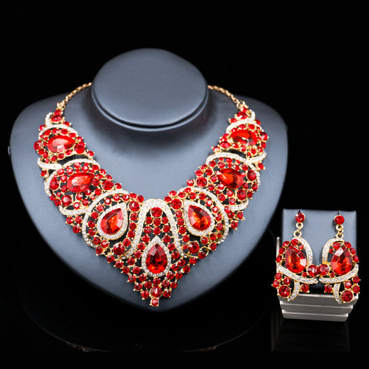 Exaggerated blue rhinestone and pearl bridal necklace and earring set with silver-tone alloy plating. - Image 10
