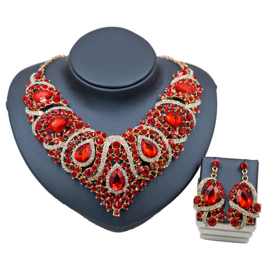 Exaggerated blue rhinestone and pearl bridal necklace and earring set with silver-tone alloy plating. - Image 4