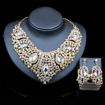 Exaggerated blue rhinestone and pearl bridal necklace and earring set with silver-tone alloy plating. - Image 11
