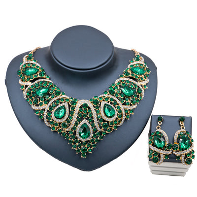 Exaggerated blue rhinestone and pearl bridal necklace and earring set with silver-tone alloy plating. - Image 5