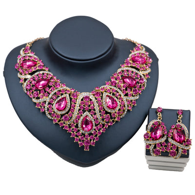 Exaggerated blue rhinestone and pearl bridal necklace and earring set with silver-tone alloy plating. - Image 7