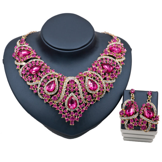 Exaggerated blue rhinestone and pearl bridal necklace and earring set with silver-tone alloy plating. - Image 7