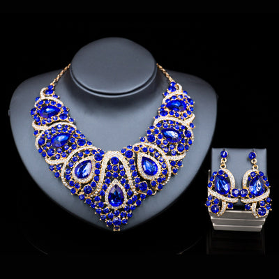 Exaggerated blue rhinestone and pearl bridal necklace and earring set with silver-tone alloy plating. - Image 8