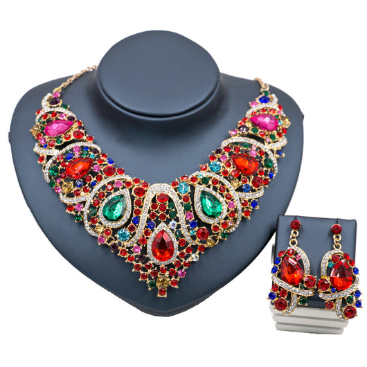 Exaggerated blue rhinestone and pearl bridal necklace and earring set with silver-tone alloy plating. - Image 3
