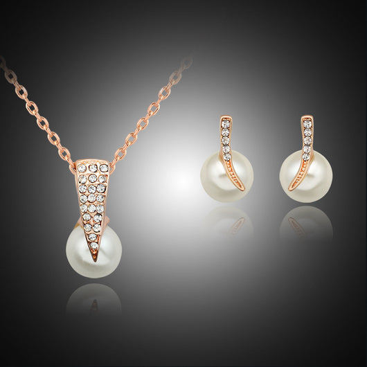 Rhinestone and pearl necklace and stud earring set with rose gold-toned metal, ideal for weddings or parties. - Image 2