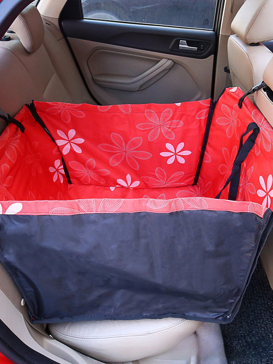 Brown pet car mat with colorful dog pattern installed in a car's rear seat, protecting upholstery. - Image 2
