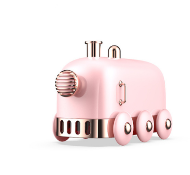 Pink retro mini train ultrasonic humidifier and aroma diffuser with rose gold accents on a white background.