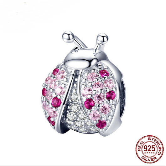 Dijes de Mariquita de Plata Esterlina 925 con Siete Cristales