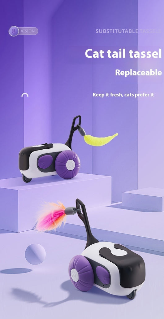 White and black remote control cat toy car with purple wheels and an orange feather, next to a white cat-shaped remote. - Image 16