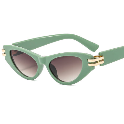 Black cat-eye sunglasses with dark gray lenses and gold-tone hinge accents on a white background. - Image 24