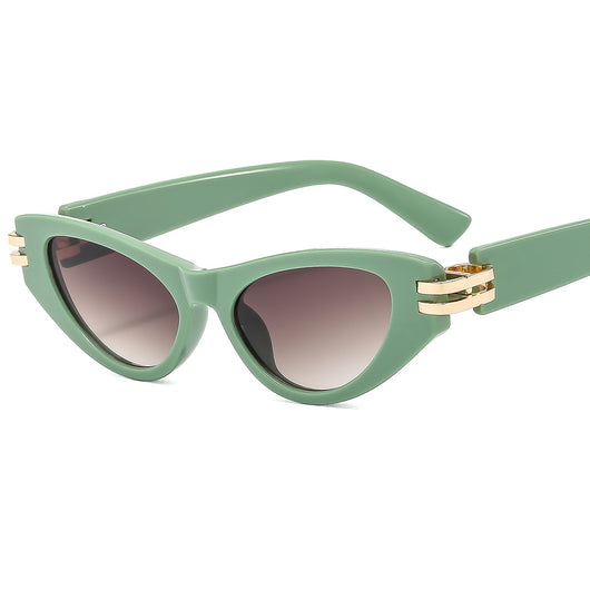 Black cat-eye sunglasses with dark gray lenses and gold-tone hinge accents on a white background. - Image 24