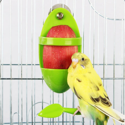 Bright green plastic bird food rack with a lower tray and a leaf-shaped perch, designed for cuttlefish. - Image 10