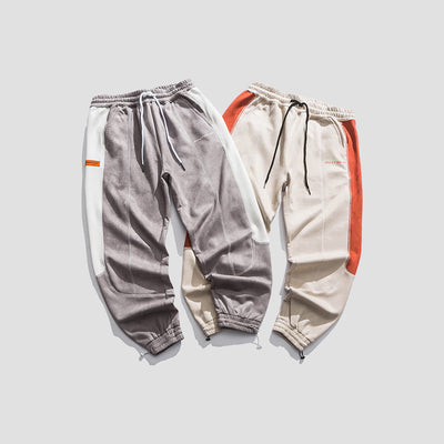Pantalones Deportivos Hong Kong con Costuras Contrastadas y Tiras Ajustables