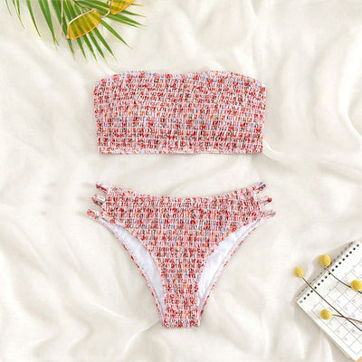 Floral smocked strapless bandeau bikini with high-cut bottoms featuring side straps, in white, teal, and red. - Image 7