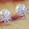 Aretes Reversibles Perla de Nieve con Zircón