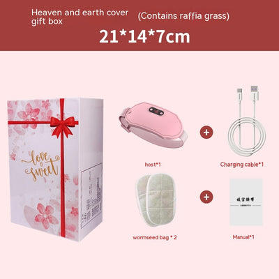 Pink stomach warming belt with vibration and heating, USB charging cable, two wormwood bags, and manual in a floral gift box. - Image 3