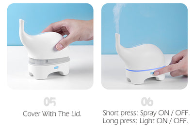 Pink elephant-shaped ultrasonic aromatherapy machine with a subtle light band and trunk-like mist outlet. - Image 11