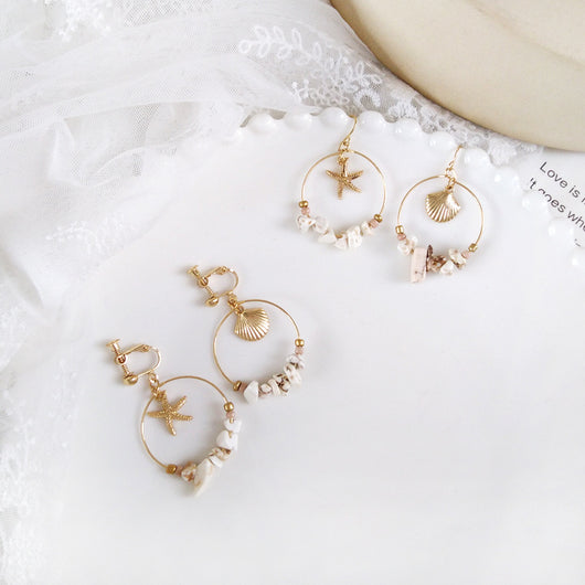 Aretes Estrella de Cinco Puntas en Metal Salvaje con Concha Marina - Image 5