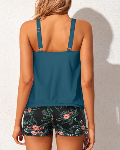 Women's two-piece tankini swimsuit with a colorful abstract print tank top and solid black ruched swim shorts. - Image 26