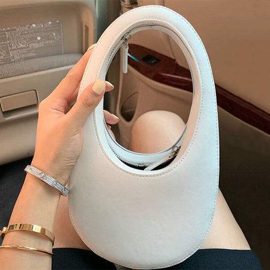Bolso de Mano Tridimensional con Forma de Huevo