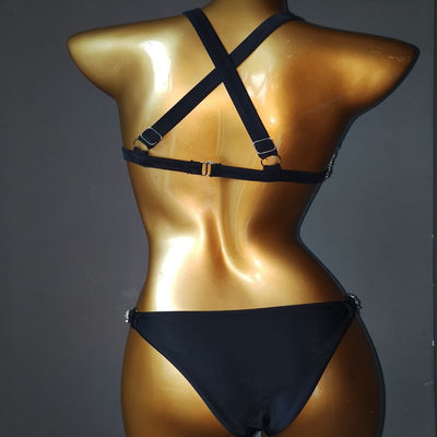 White rhinestone bikini with triangle tops, high-cut bottoms, and silver-toned O-rings and chains. - Image 3