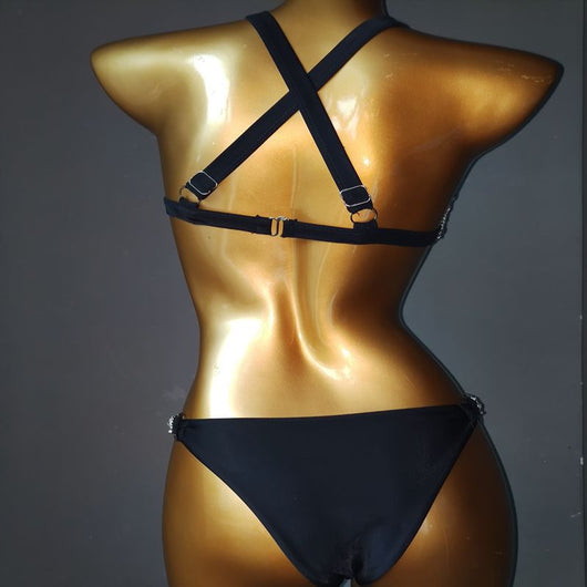 White rhinestone bikini with triangle tops, high-cut bottoms, and silver-toned O-rings and chains. - Image 3